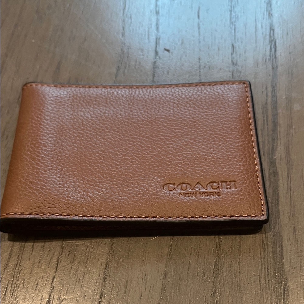 Coach Men's Tan Leather small wallet.